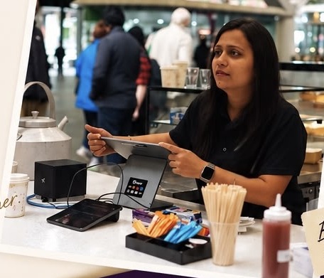 Bhumika, co-founder of Chai Biskit, at the counter